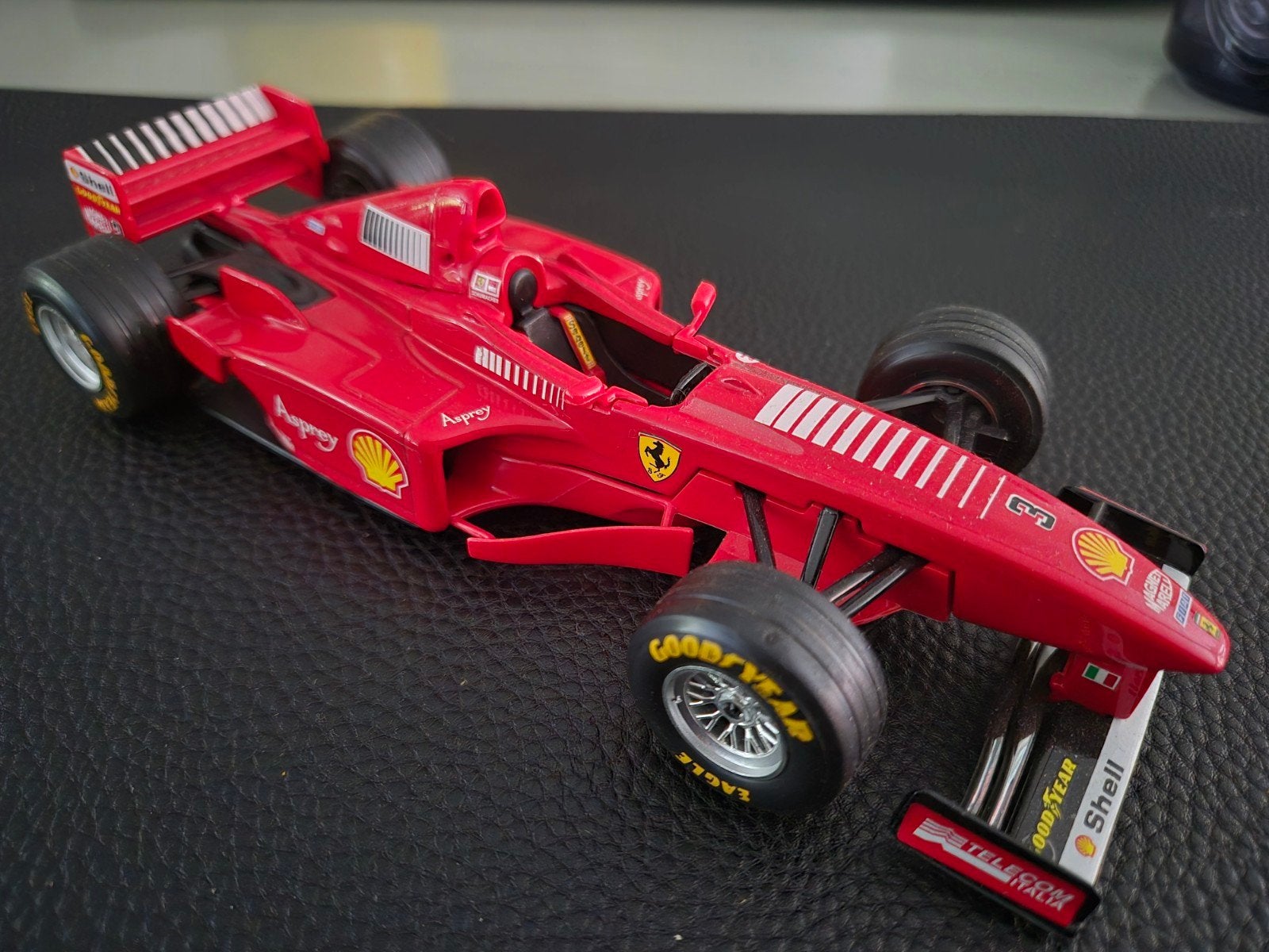 Ferrari F300 Bburago, Ophalen of Verzenden, Zo goed als nieuw, Auto, Bburago
