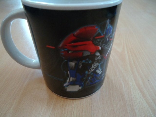 Transformers mok, Optimus Prime, Verzamelen, Transformers, Overige generaties, Ophalen of Verzenden, Zo goed als nieuw, Overige rassen