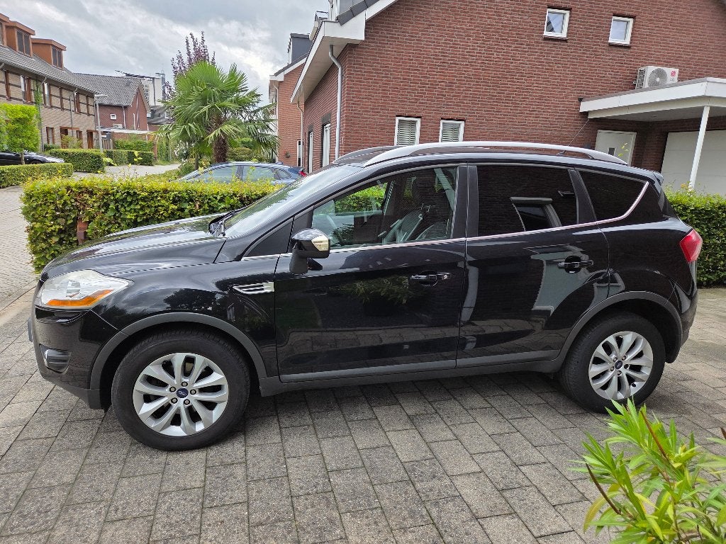Dikke Ford Kuga 2.5 T 147KW AWD AUT 2011 Zwart Titanium, Automaat, Euro 5, 1553 kg, Leder en Stof