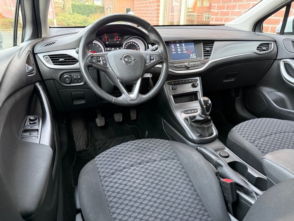 Opel Astra Sports Tourer 1.0 T. Business 105PK NAVI / AIRCO, Auto's, 21 km/l, Stof, Gebruikt, 1178 kg