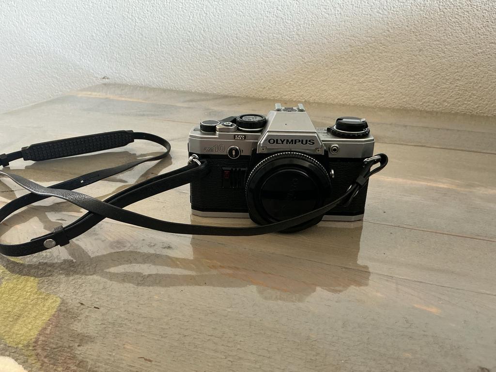 Olympus OM10 Spiegelreflexcamera met 2 lenzen., Ophalen of Verzenden, Gebruikt, Spiegelreflex, Olympus