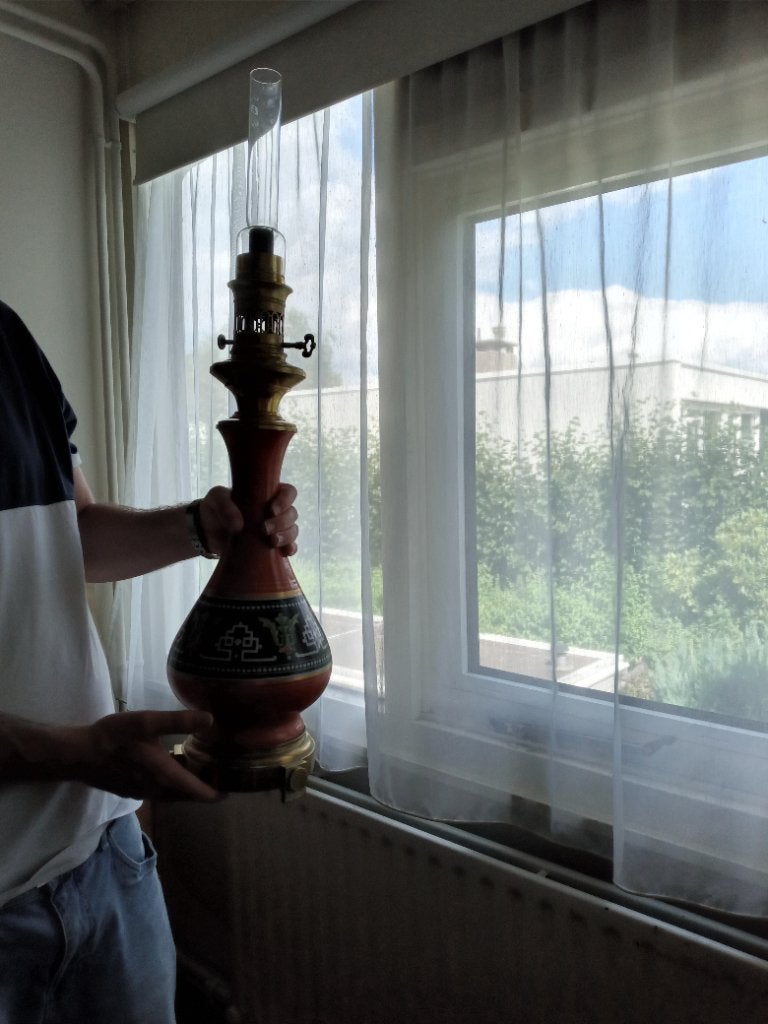 Olielamp, Ophalen