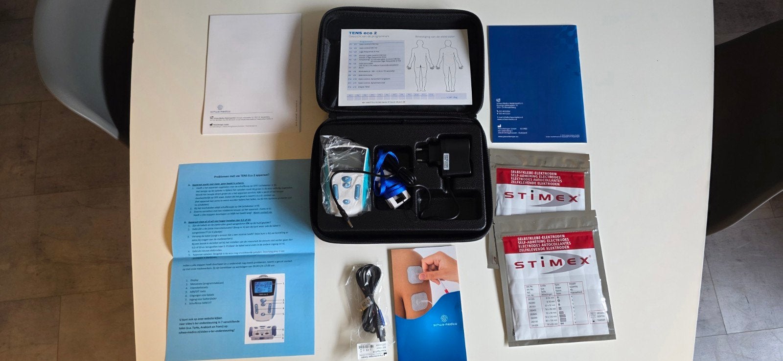 TENS eco 2 - 2-kanaals elektrostimulator, Ophalen of Verzenden, Zo goed als nieuw, Overige typen