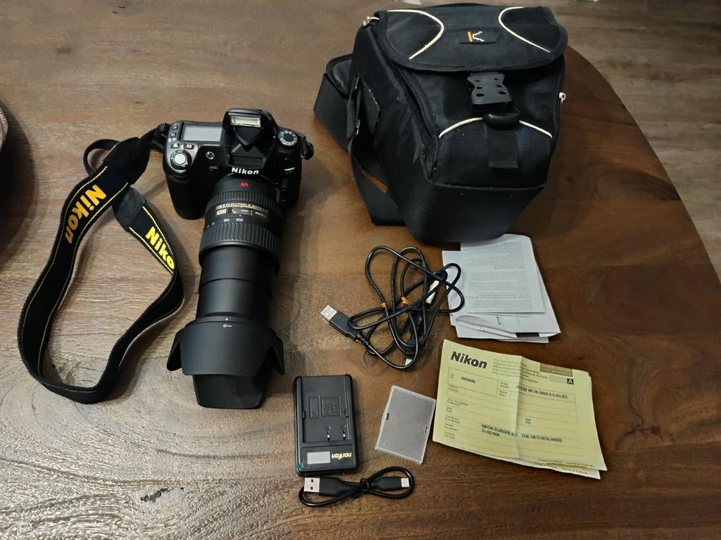 Nikon D80 spiegelreflexcamera met 18-200mm VR II lens en ac, Ophalen of Verzenden