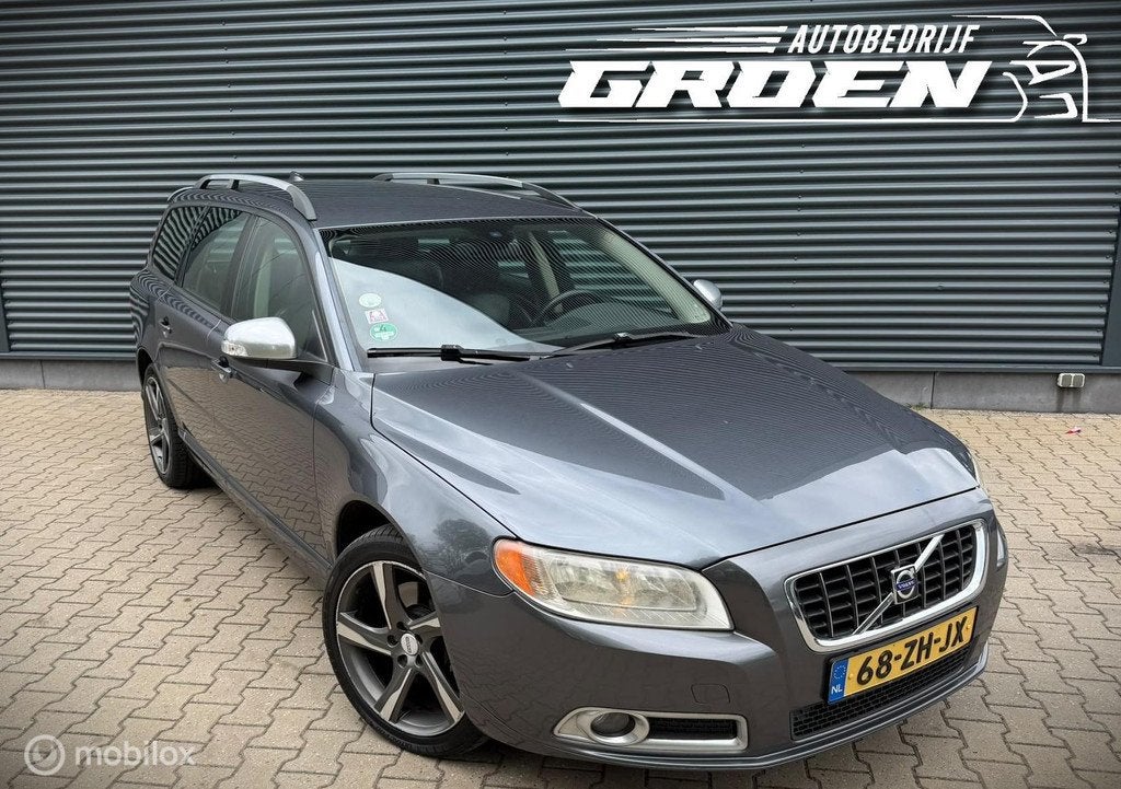 Volvo V70 2.4D Momentum TREKHAAK|CAMERA|LEER|PDC, Auto's, Volvo, 15 km/l, 163 pk, Euro 4, Zilver of Grijs