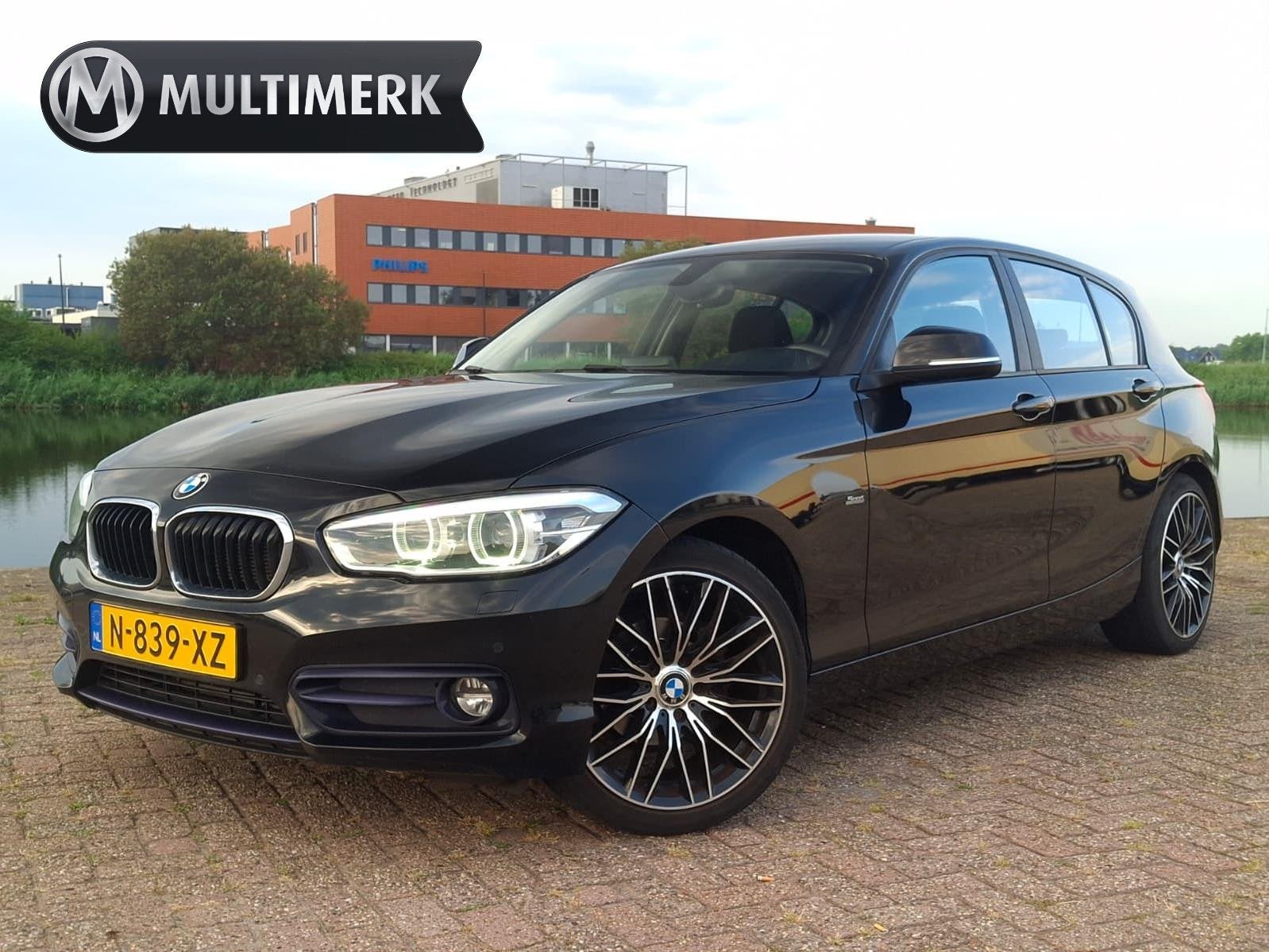 BMW 1-serie 118i High Executive Sport | AUT | STOELVERW. | T, Gebruikt, Automatische klimaatregeling, Zwart, Leder