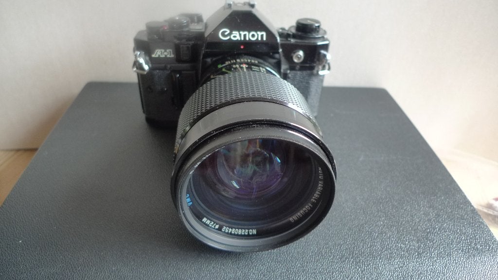 Canon A-1 + lens Vivitar Series 1  35-85 mm, Ophalen of Verzenden, Gebruikt, Spiegelreflex, Canon