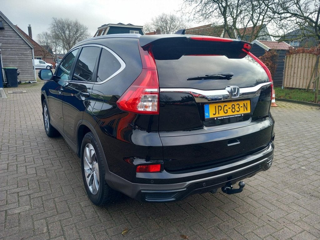 Honda CR-V 2.0 4WD Executive automaat trekhaak winterbanden, Auto's, Honda, 12 maanden, Gebruikt, Euro 6, Zwart
