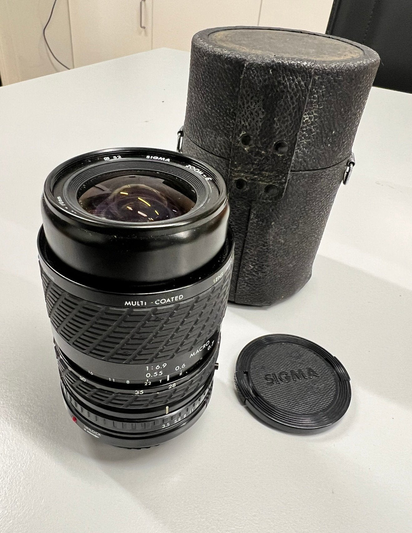 Sigma Zoom-E 1:3.5-4.5 f= 28-70 Multi-Coated + Canon adapt., Sigma, Ophalen of Verzenden, Zo goed als nieuw, Zoom