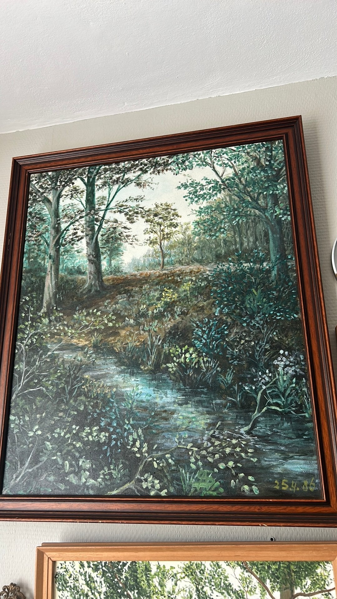 Groot schilderij met een bos erop afgebeeld,l, Ophalen
