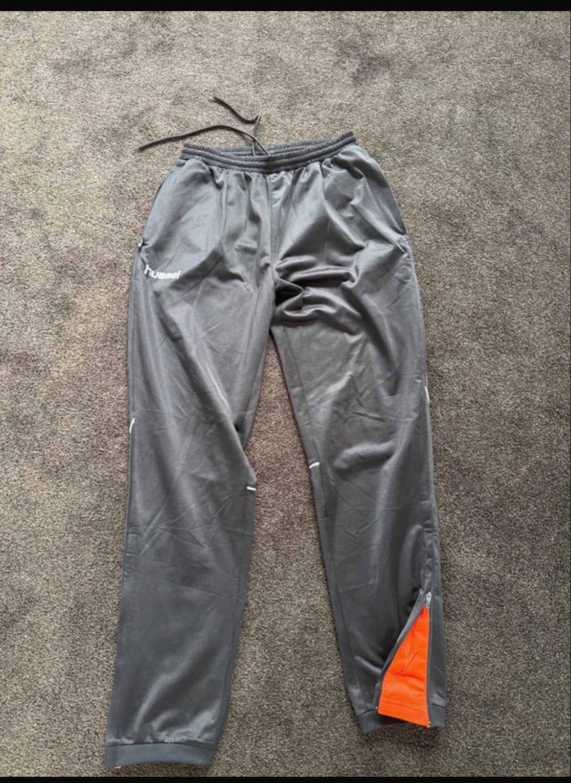 Hummel trainingsbroek maat L - Zo goed als nieuw, Ophalen of Verzenden, Zo goed als nieuw, Maat 52/54 (L), Grijs