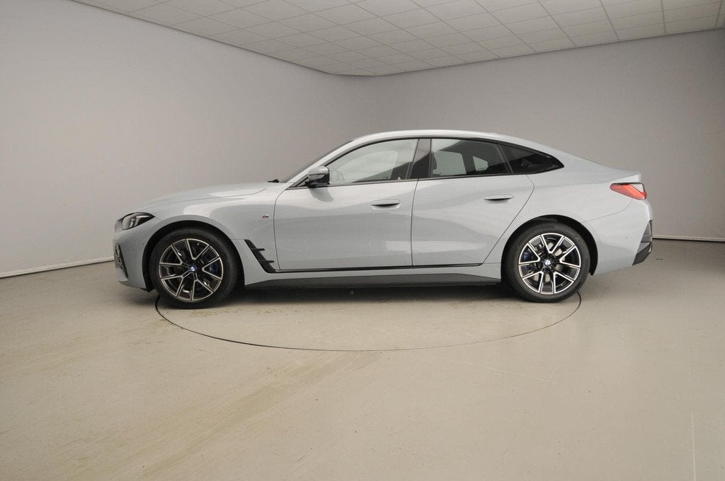 BMW i4 Gran Coupé eDrive35 | M-Sportpakket | LED | HUD | Ac, Auto's, BMW, Gebruikt, Zwart, Met garantie (alle), 31 min