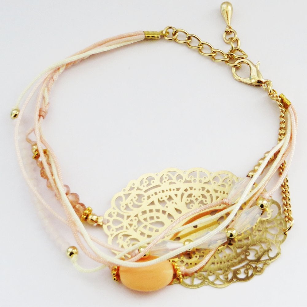 Goud- met rozekleurig armband, nieuw - laatste stuks, Sieraden, Tassen en Uiterlijk, Armbanden, Nieuw, Ophalen of Verzenden, Met bedels of kralen