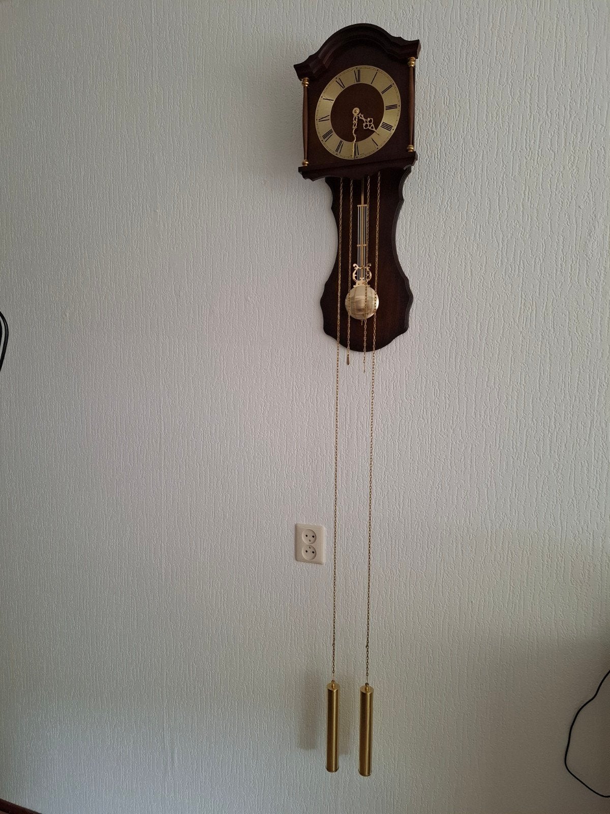 Wandklok met Slagwerk en Kettinggewichten, Ophalen