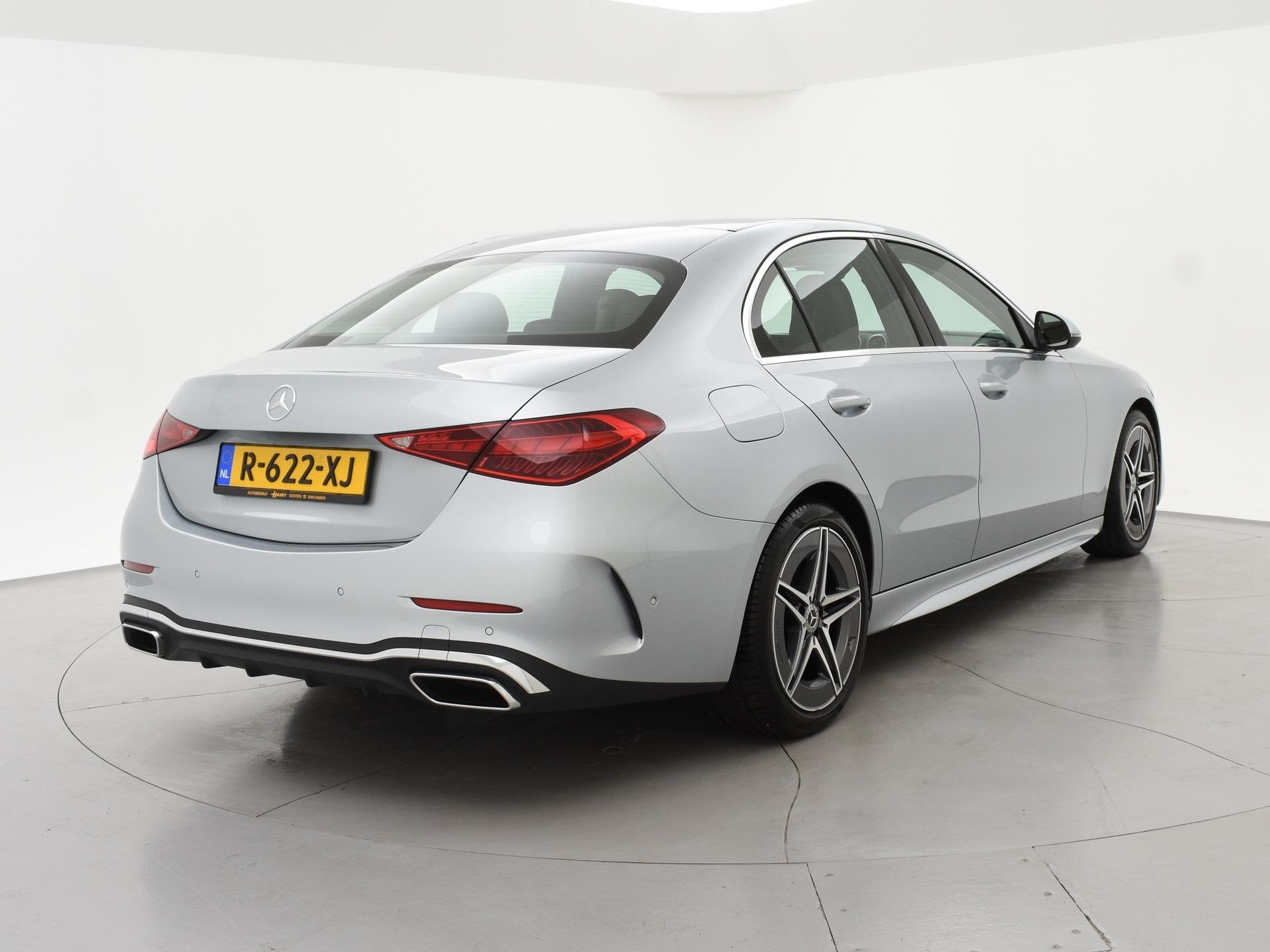 Mercedes-Benz C-klasse 180 AMG LINE SEDAN + SFEERVERLICHTING, Automaat, 4 cilinders, Automatische klimaatregeling, Leder en Stof