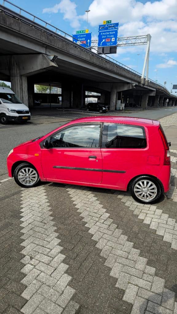 Daihatsu Cuore 1.0 3D 2007 Rood., Auto's, Daihatsu, 600 kg, 18 €/maand, Cuore, Origineel Nederlands
