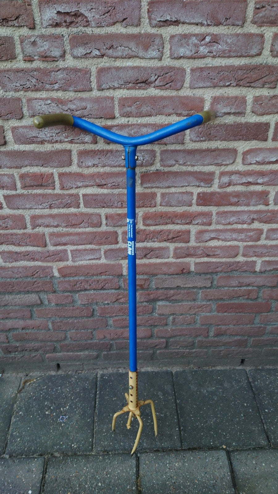 Tuinklauw gold gardenclaw, Ophalen