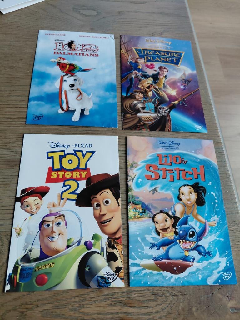 Disney dvd boekjes Toy Story, Lilo Stitch, Dalmatiërs enz, Ophalen of Verzenden, Overige figuren, Gebruikt, Plaatje of Poster