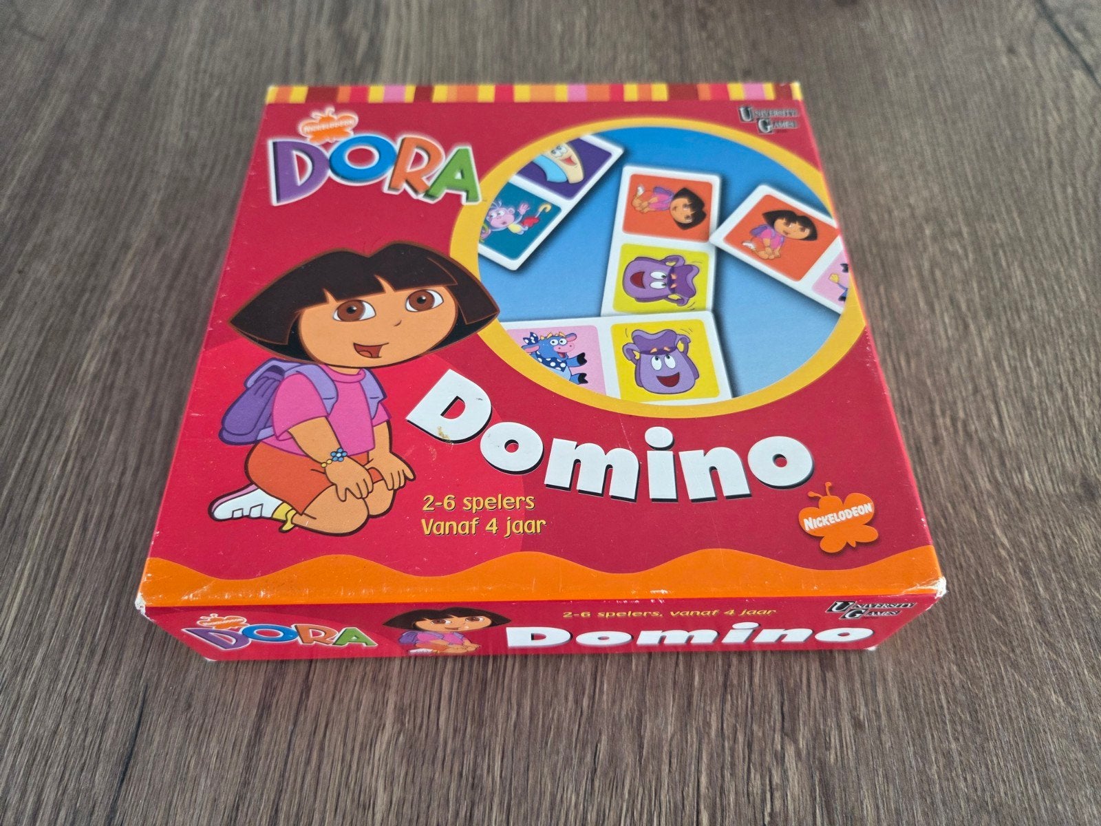 Dora Domino, Hobby en Vrije tijd, Gezelschapsspellen | Bordspellen, Vijf spelers of meer, Ophalen of Verzenden, Gebruikt, University Games