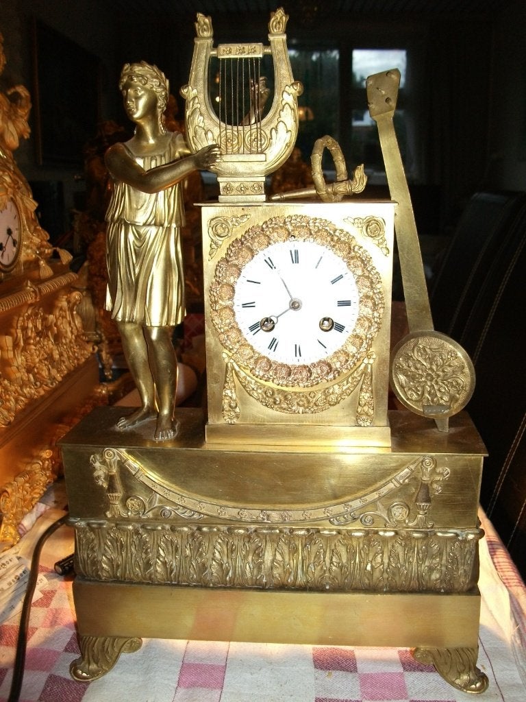 Een Bronzen  EMPIRE Pendule, Antiek en Kunst, Ophalen of Verzenden