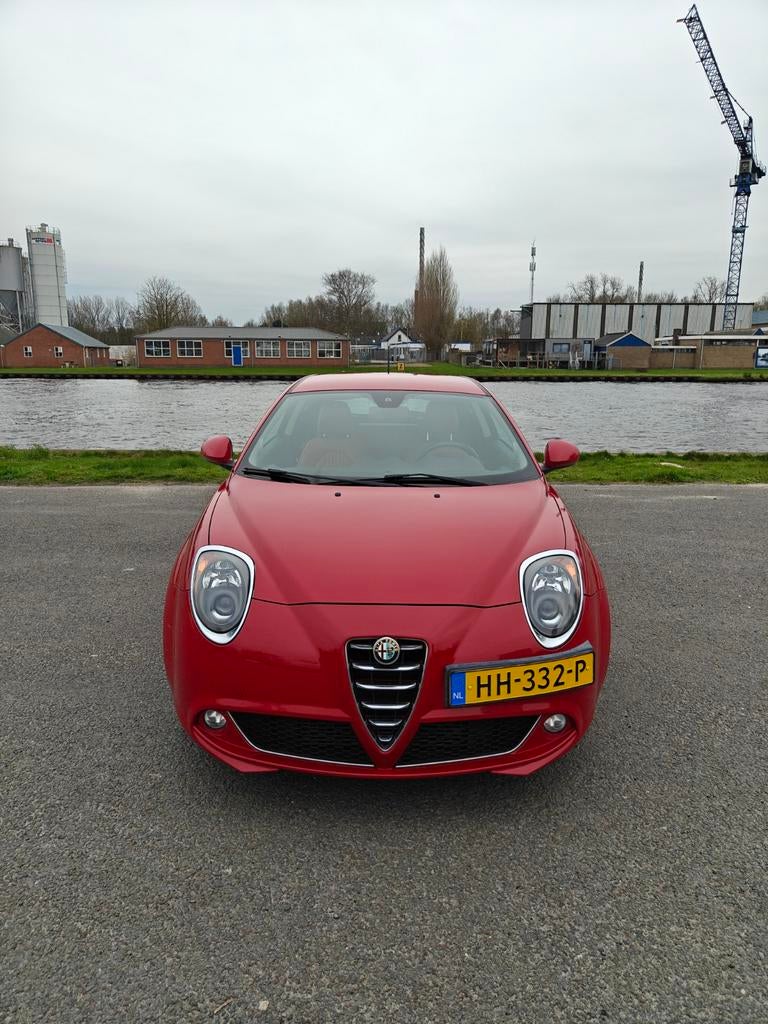 Alfa Romeo MiTo 0.9 Turbo Twinair 74KW/100PK 2015 Rood, Auto's, Alfa Romeo, Voorwielaandrijving, Euro 6, 49 €/maand, Origineel Nederlands