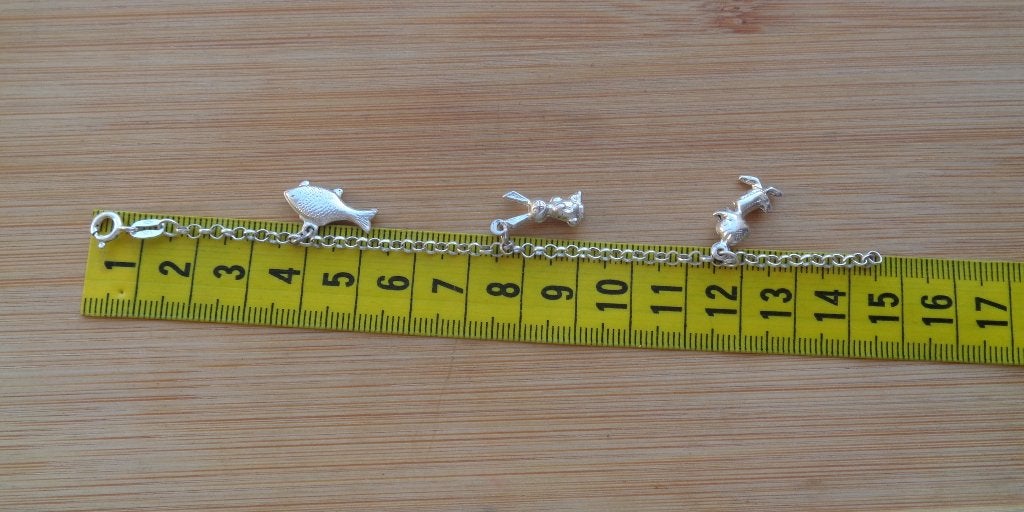zilveren kinder bedel armband 3 bedels [313], Verzenden, Zo goed als nieuw, Met bedels of kralen, Zilver