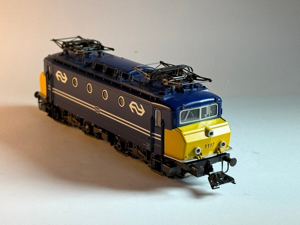 Märklin 3424 H0 E-loc NS 1117 blauw gele neus Delta digitaal, Wisselstroom, Locomotief, Ophalen of Verzenden, Service@maerklin.de