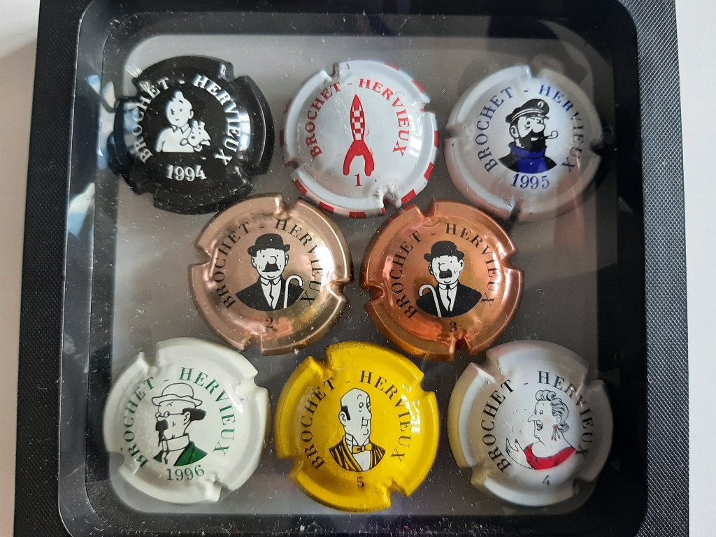 Zeldzame complete champagne capsules Kuifje, Ophalen of Verzenden, Kuifje, Nieuw, Beeldje of Figuurtje