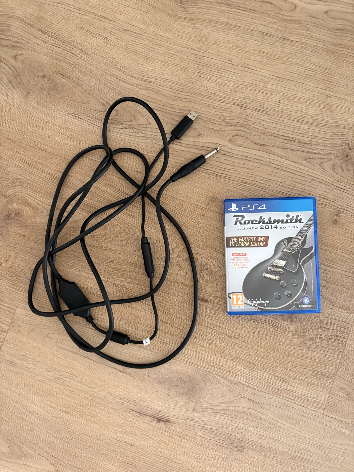 Rocksmith 2014 + Real Tone Cable - PS4 - Ubisoft, Muziek, 1 speler, Ophalen of Verzenden, Zo goed als nieuw