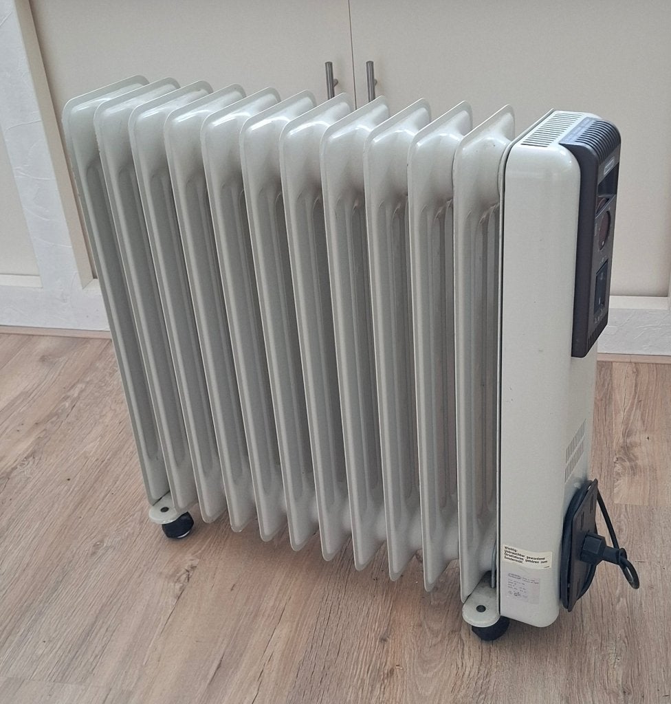 Electrische Olie radiator delonghi, Doe-het-zelf en Verbouw, Ophalen, 30 tot 80 cm, Gebruikt, Radiator