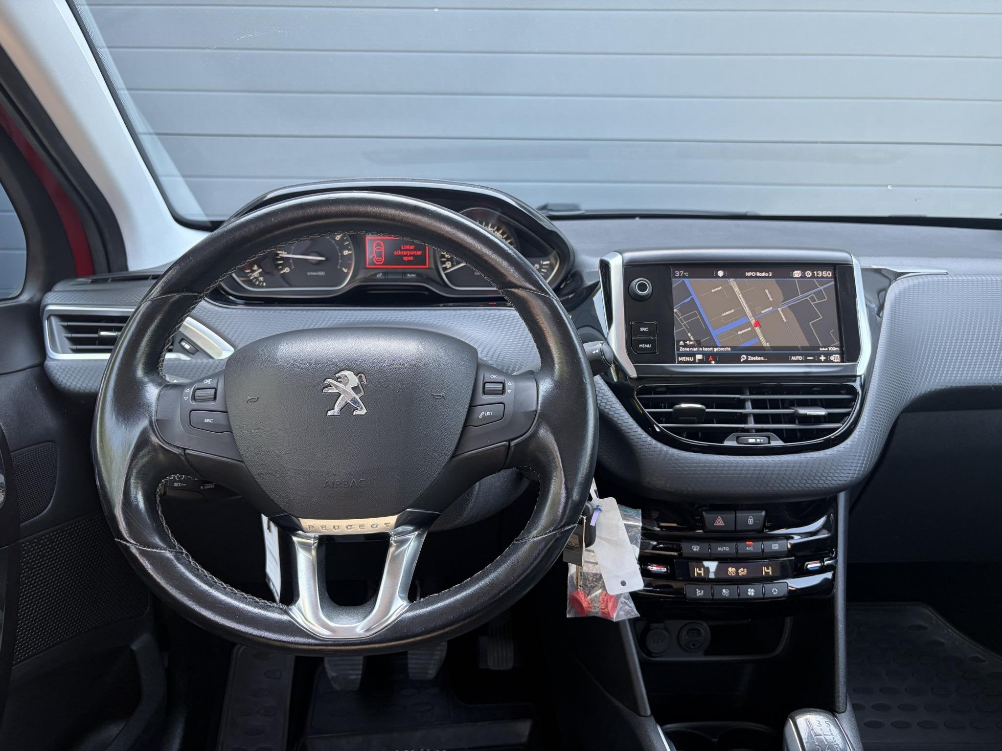Peugeot 208 1.2 PureTech Allure 1e Eigenaar,D-riem vv in 202, Voorwielaandrijving, Euro 6, Leder en Stof, 23 km/l