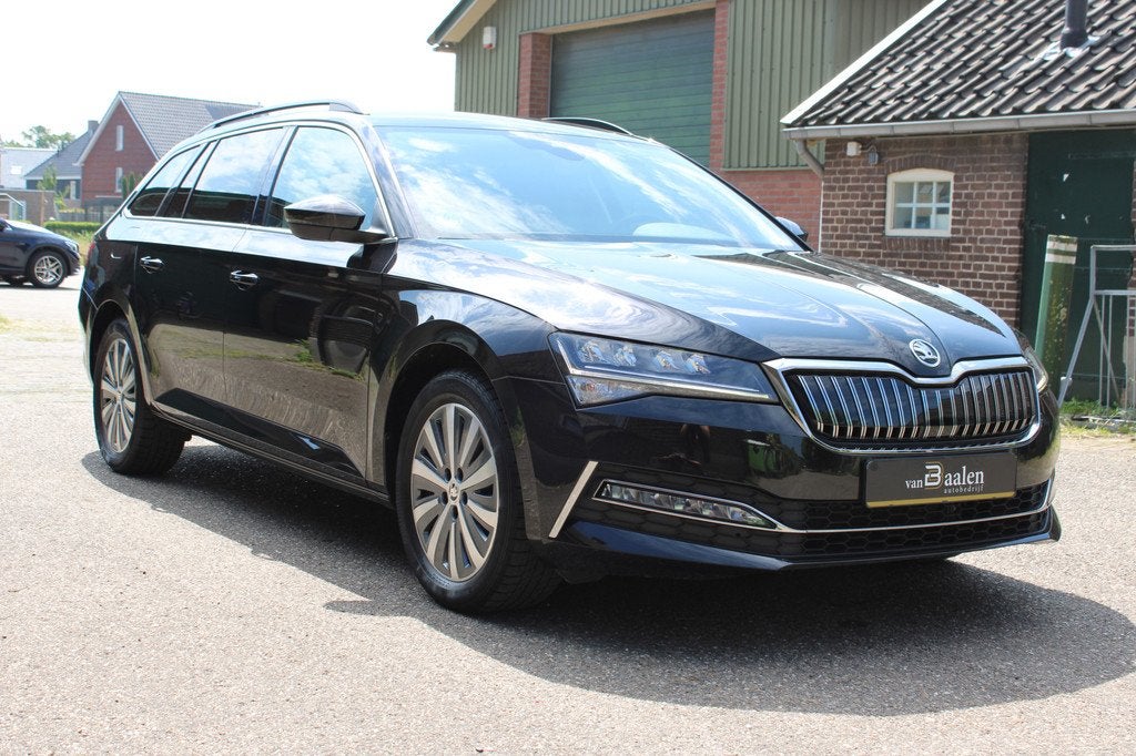 Skoda Superb Combi 1.4 TSI iV Business Edition SOh 92% NAVI, Stof, Gebruikt, Zwart, Hybride Elektrisch/Benzine