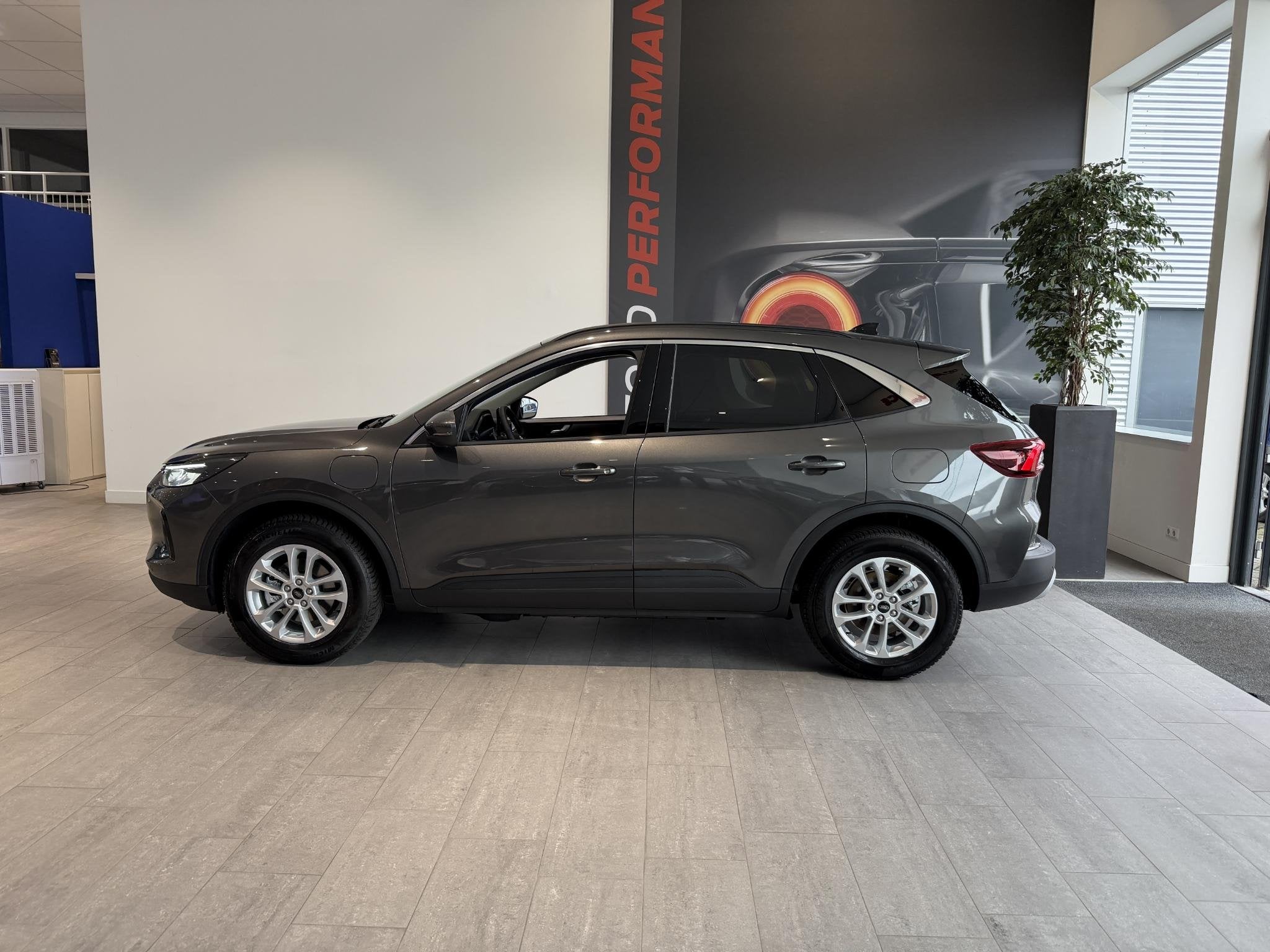 Ford Kuga 2.5 PHEV Titanium | ELEKTRISCH WEGKLAPBARE TREKHAA, Auto's, Lichtsensor, Euro 6, 4 cilinders, Plug-in hybride
