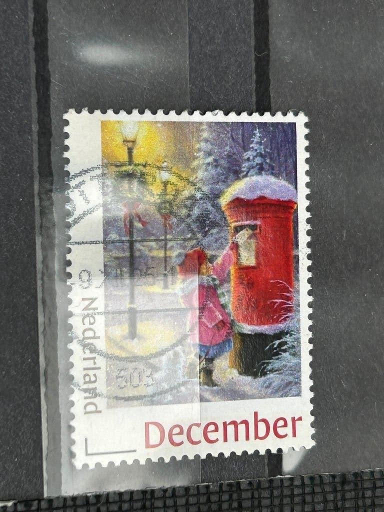 Persoonlijke Kerst/december zegel. Kindje bij brievenbus., Ophalen of Verzenden, Na 1940, Gestempeld