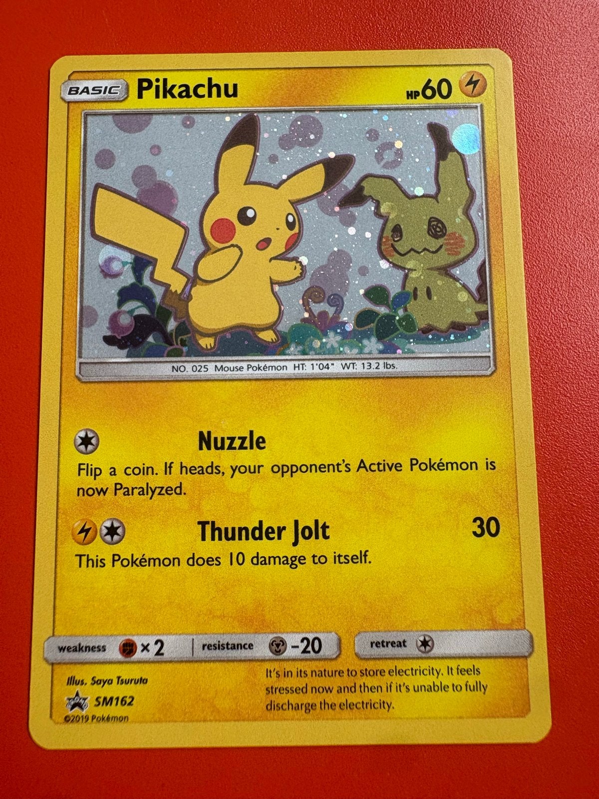 Pikachu & Mimikyu SM162 Promo Pokémon Kaart, Ophalen of Verzenden, Zo goed als nieuw, Losse kaart, Foil