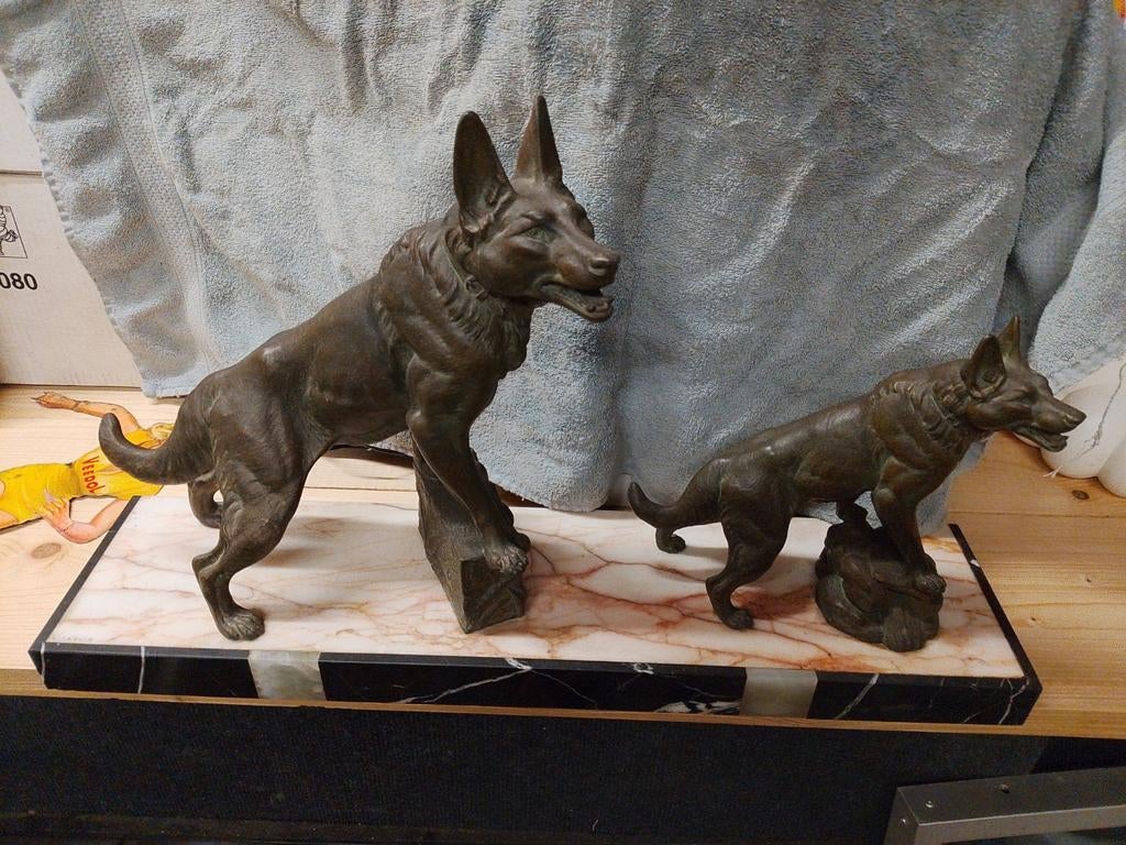 bronzen beeld,l carvin, Ophalen