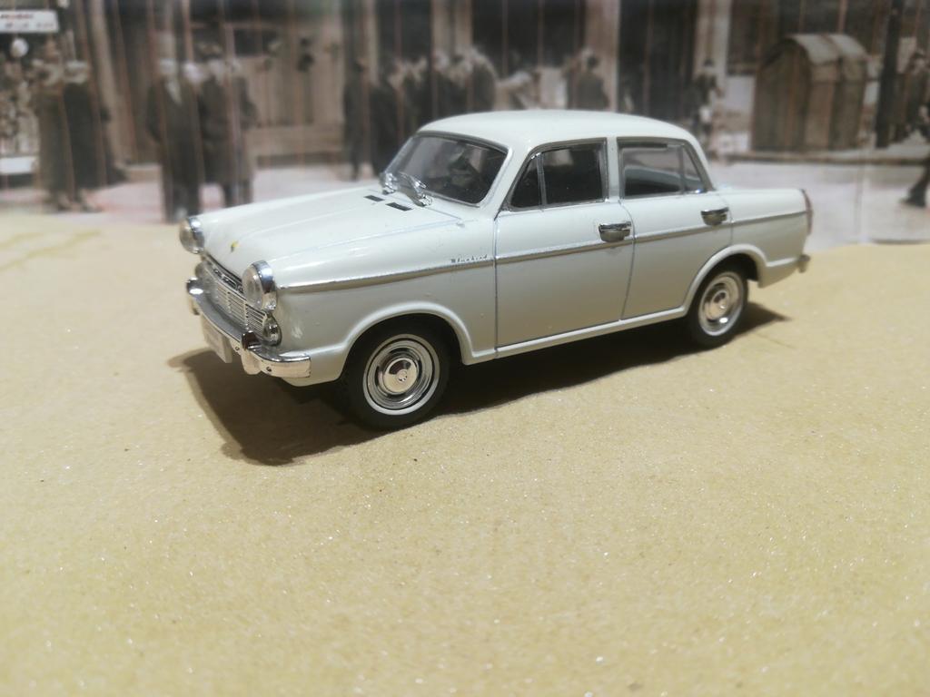 Datsun Bluebird 310 1961 1:43 Norev, Hobby en Vrije tijd, Modelauto's | 1:43, Ophalen of Verzenden, Zo goed als nieuw, Auto, Overige merken