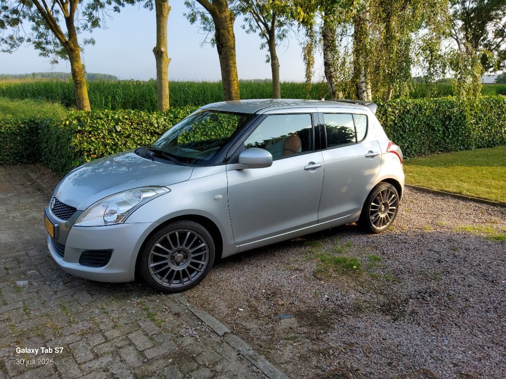 Suzuki Swift 1.2 5-D 2011 Grijs, Auto's, Voorwielaandrijving, Stof, 4 cilinders, 400 kg