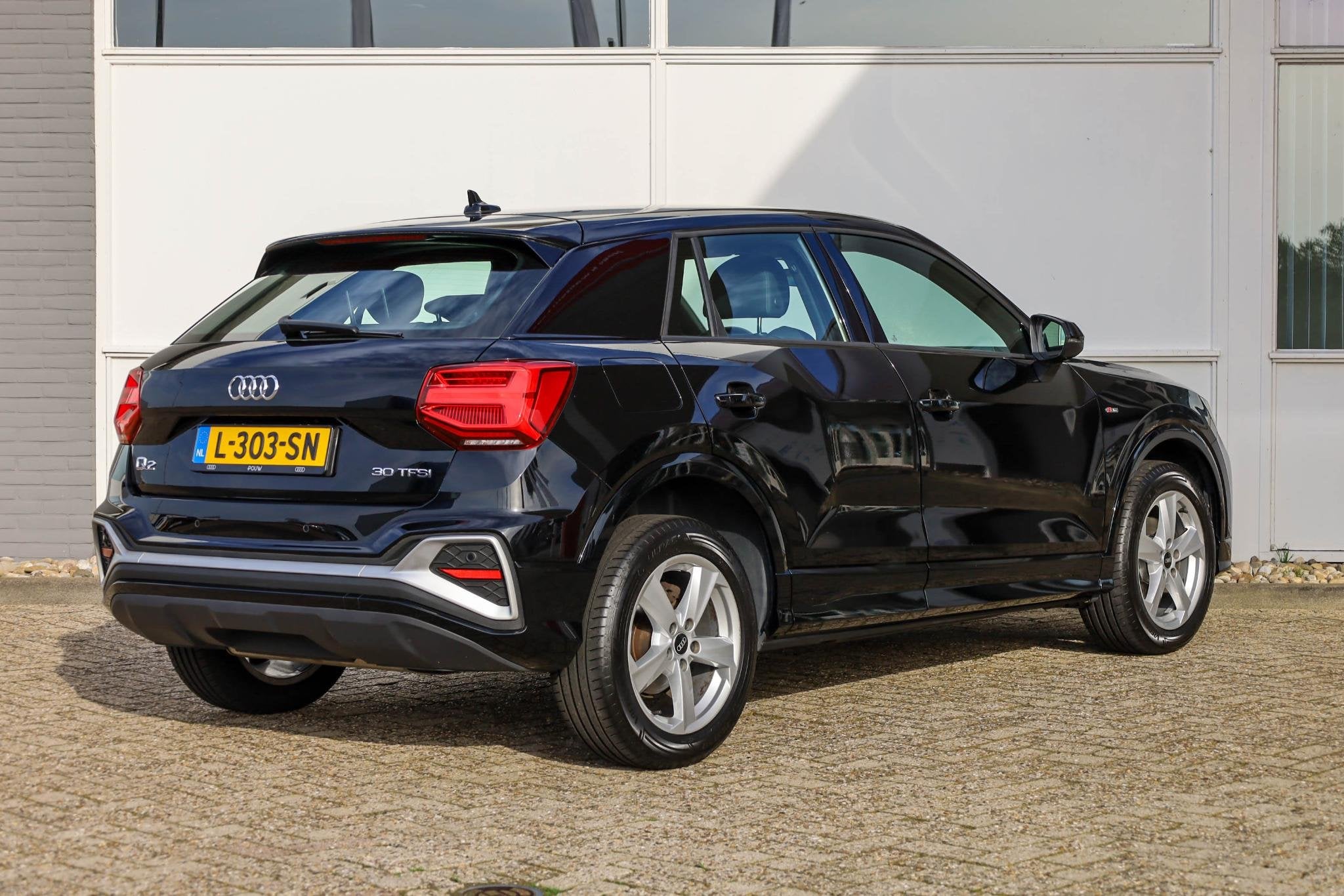 Audi Q2 30 TFSI 110pk S Edition | S Line | DAB+ | Cruise Con, Auto's, Voorwielaandrijving, 12 maanden, Gebruikt, Leder en Stof