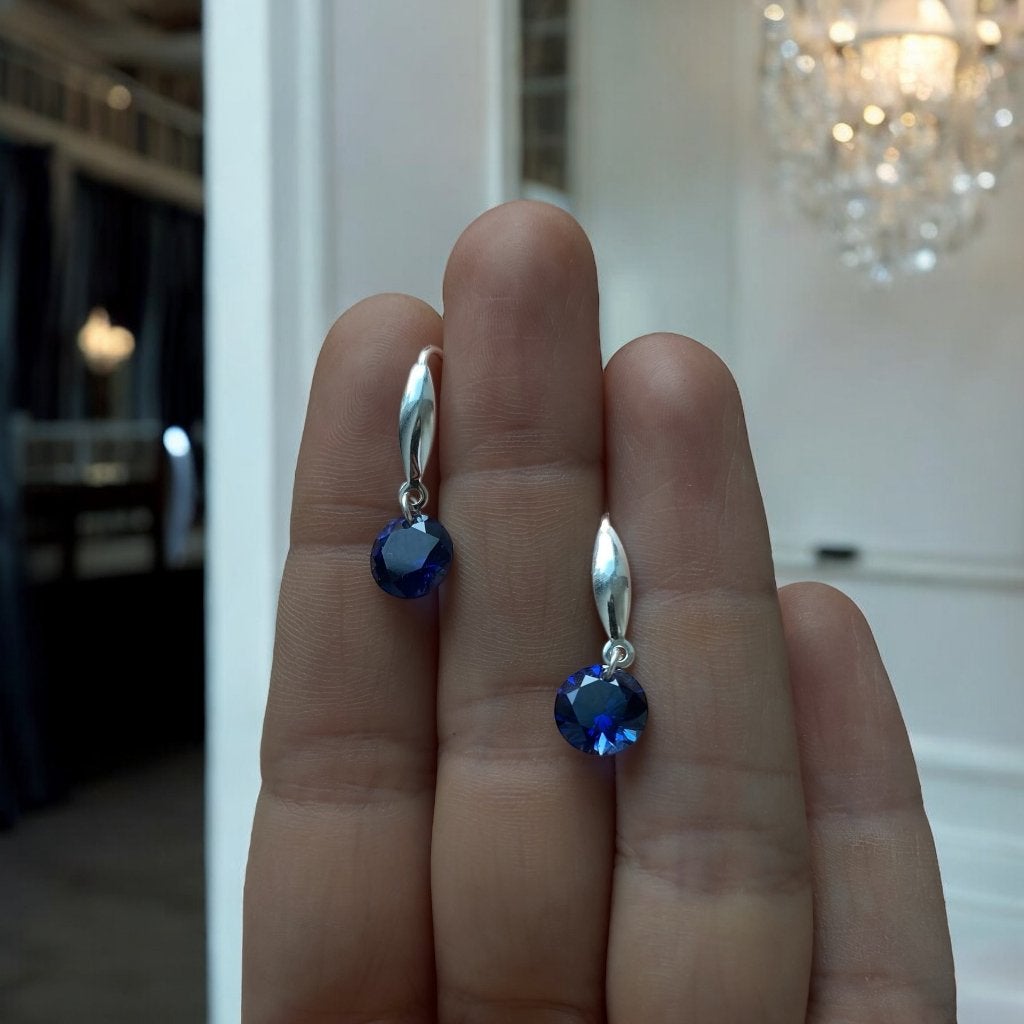 oorbellen zilver 925 saffier, Hangers, Blauw, Ophalen of Verzenden, Zo goed als nieuw