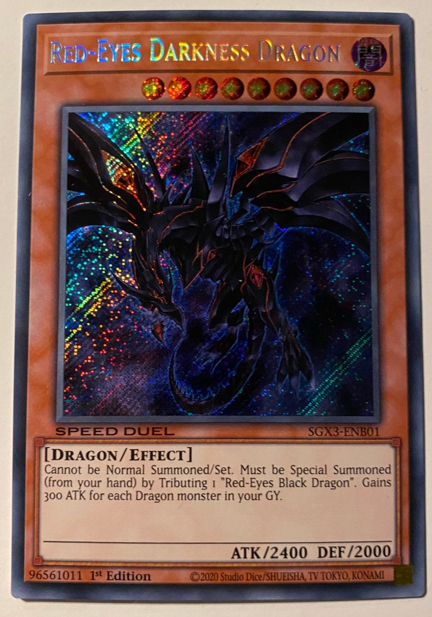 Yu-Gi-Oh! Red-Eyes Darkness Dragon SGX3 1st Edition !, Ophalen of Verzenden, Zo goed als nieuw, Losse kaart, Foil