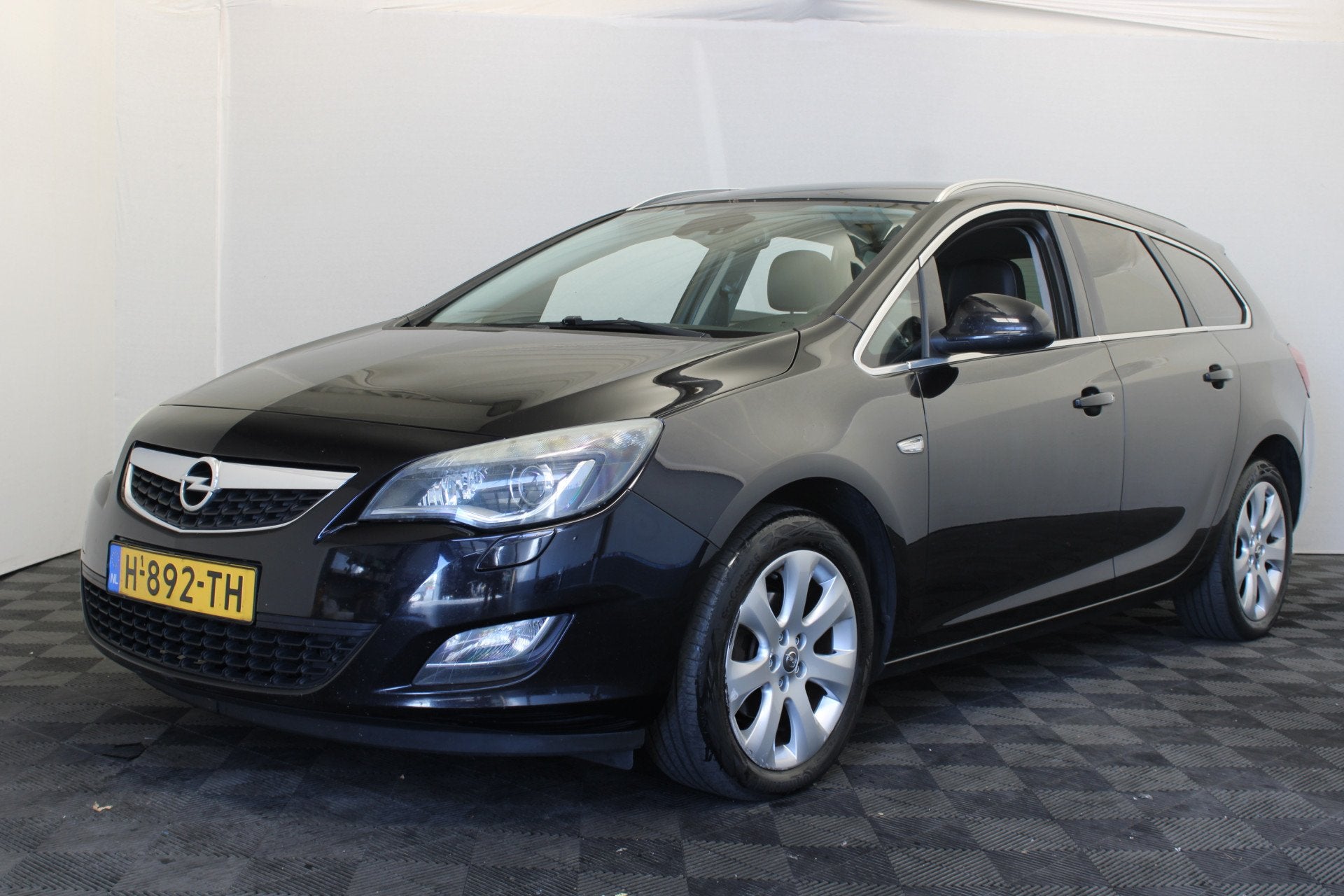 Opel Astra Sports Tourer 1.4 Turbo Edition (bj 2011), Auto's, Opel, Voorwielaandrijving, Euro 5, Stof, Gebruikt