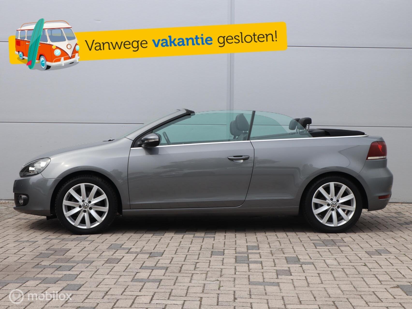 Volkswagen Golf Cabrio 1.2 TSI Leer Navi LED Cruise Clima, Auto's, Voorwielaandrijving, Euro 5, Zwart, 4 cilinders