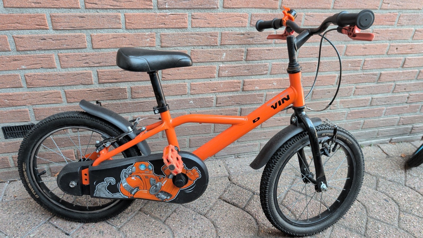 Oranje kinderfiets - voorrem moet nagekeken worden, Ophalen