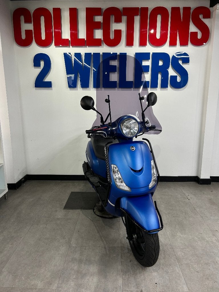 Sym Fiddle II 12-2022 Matblauw IN NIEUWSTAAT, Ophalen of Verzenden, Zo goed als nieuw, Benzine, Fiddle