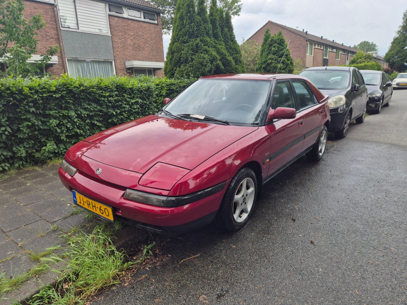 Mazda 323 1.6 I F GLX 16V U9 1994 Rood, Auto's, Mazda, Voorwielaandrijving, Stof, Zwart, 4 cilinders