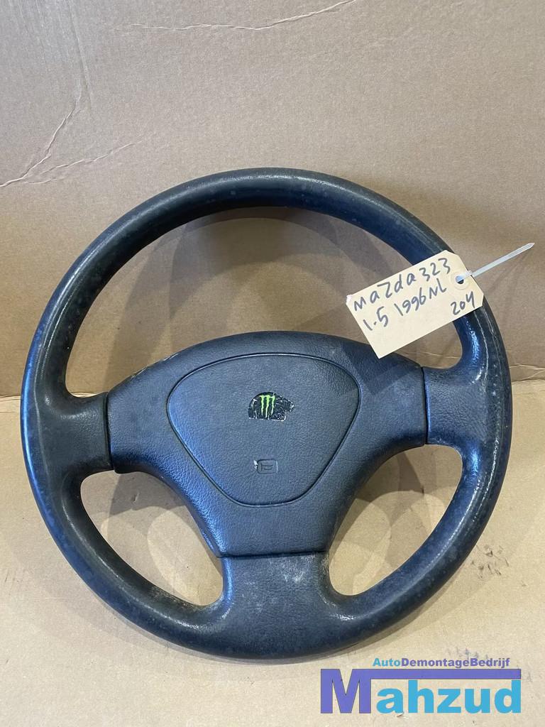 MAZDA 323 F Stuurwiel stuur 1994-1998, Auto-onderdelen, Gebruikt, Shinchi, Fuchu-Cho 3-1
730-8670  Hiroshima, Mazda Motor Corporation