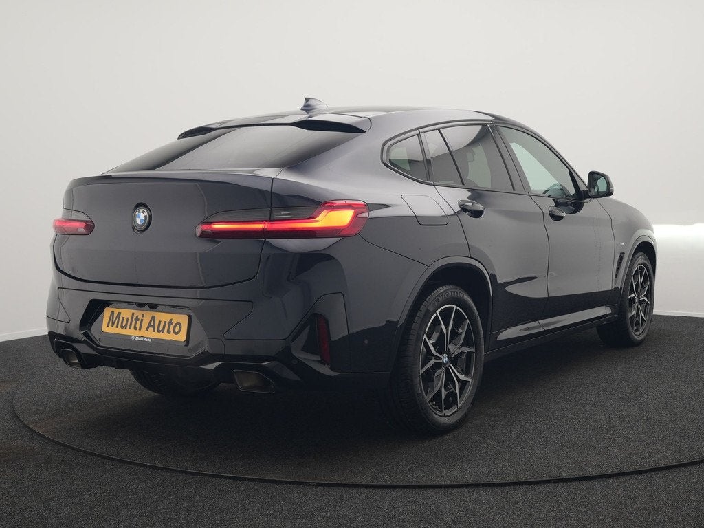 BMW X4 xDrive20i M Sport 184pk Dealer O.H. Carbon Schwarz Me, 1998 cc, Gebruikt, Zwart, 4 cilinders