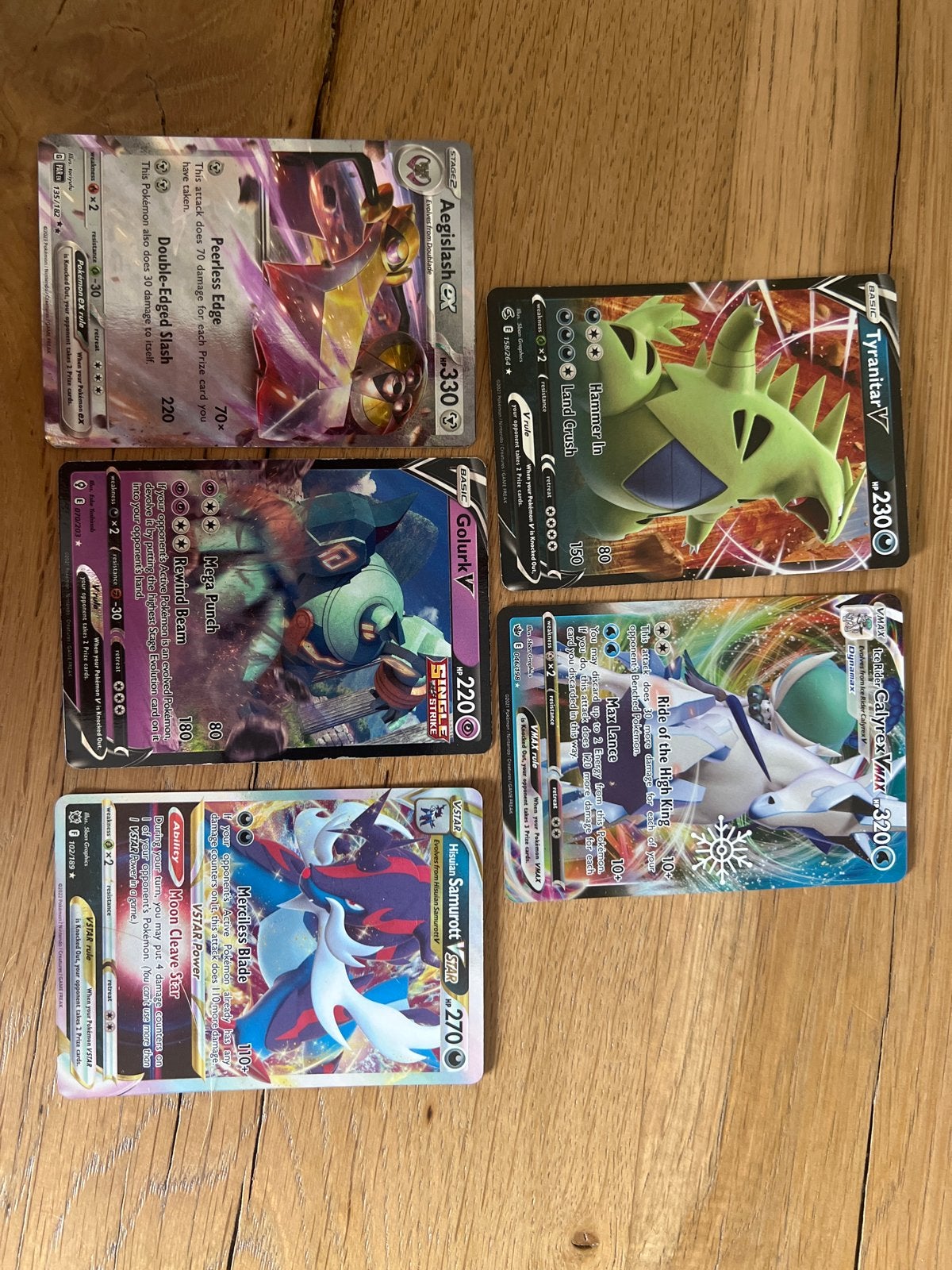 Pokémon Kaarten V/VMAX Bundel - Aegislash, Golurk, Tyranitar, Ophalen of Verzenden, Zo goed als nieuw, Meerdere kaarten