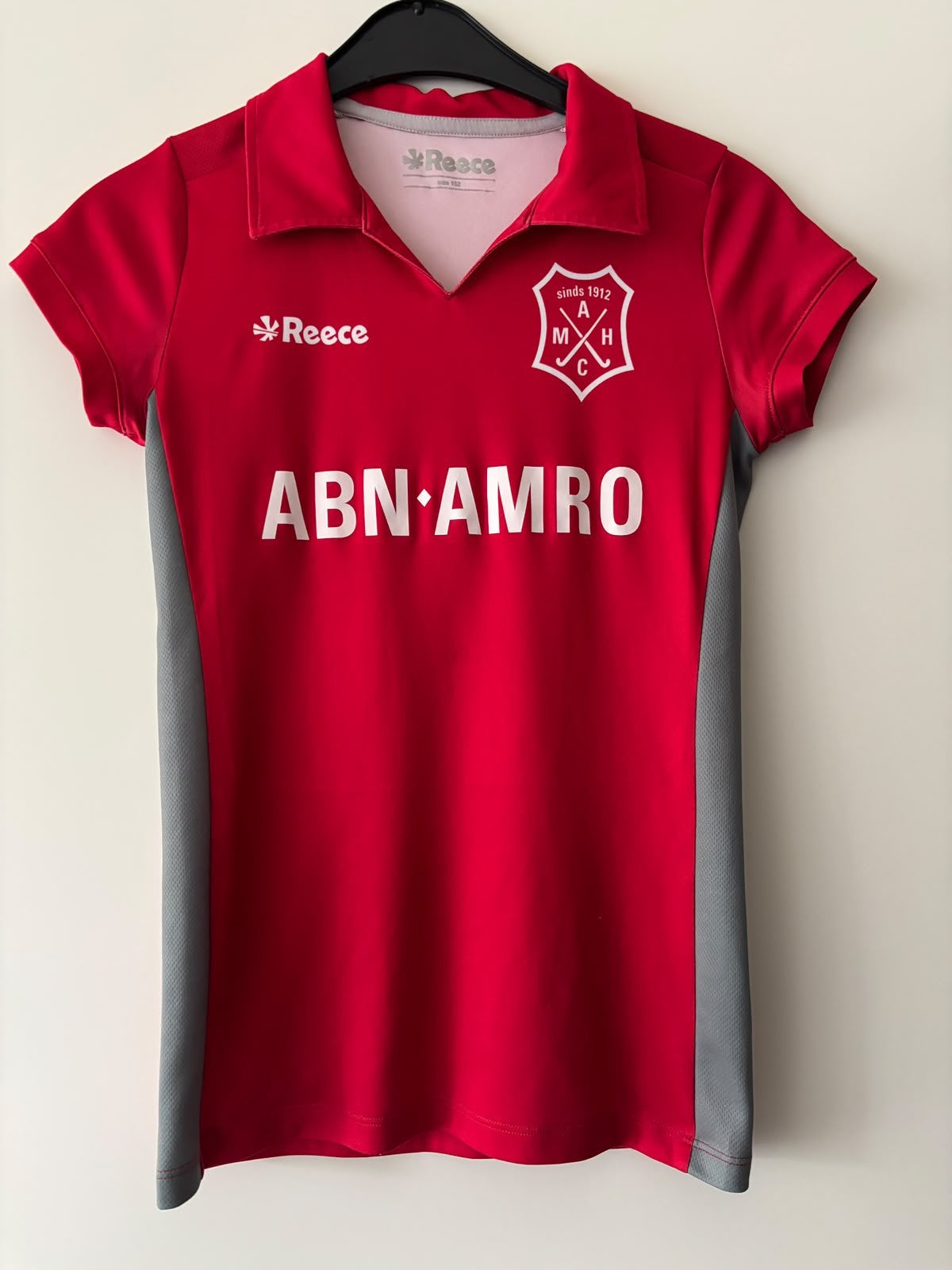 AMHC hockey polo | 152 | meisje, Ophalen of Verzenden, Zo goed als nieuw, Kleding